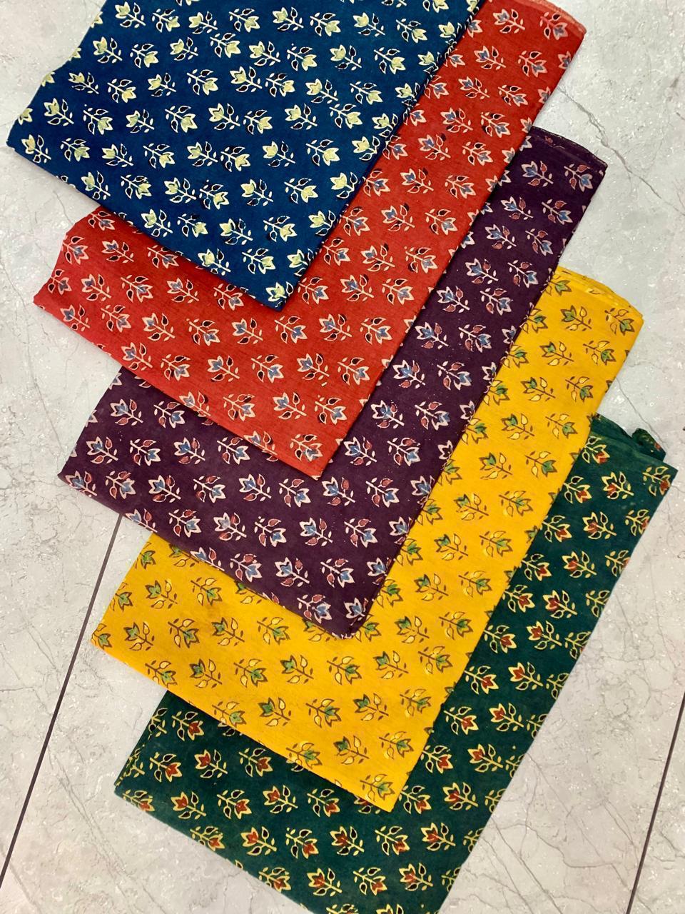 Multi-pattern Ajrakh printed pure cotton wholesale fabric featuring classic handcrafted Rajasthan designs by Fabtexs.